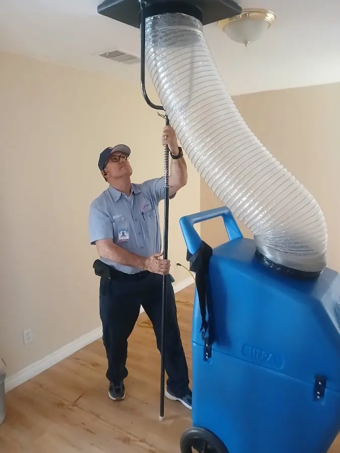 Mini Split Installation technician using HEPA equipment in Daytona Beach